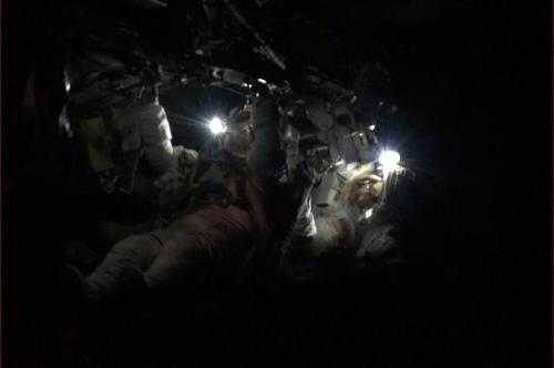 distant-traveller:  Photos from Saturday’s emergency spacewalk on the ISS  The spacewalk outside the