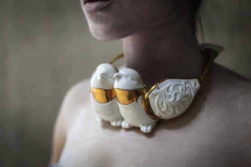 hazedolly:  Art jewellery by Qian Yang: gold-dipped salvaged antique china dolls, doll parts, and figurinesSource: Brown Paper Bag 