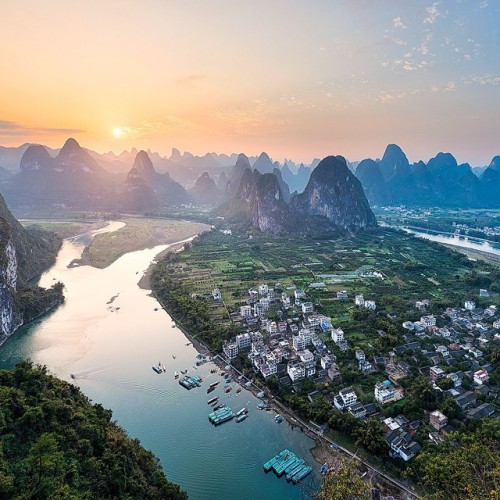 The extraordinary view of the Karst Mountains in Xingping China. Climbing the 1159 stone steps to ge