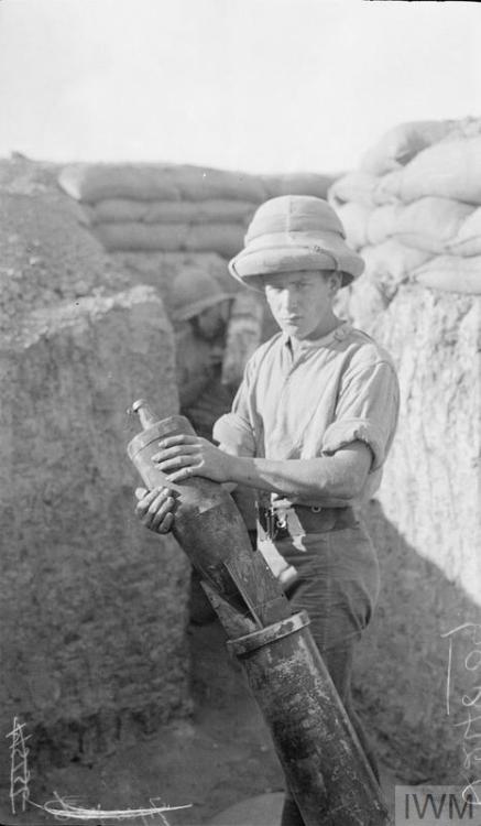 scrapironflotilla: Loading and firing a 6 Inch Newton mortar from a trench somewhere in Mesopotamia,