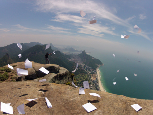 tha guy on the cliff he just finished highschool and what he did was he threw all his school papers 