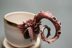 sixpenceee: This odd teacup is the creation