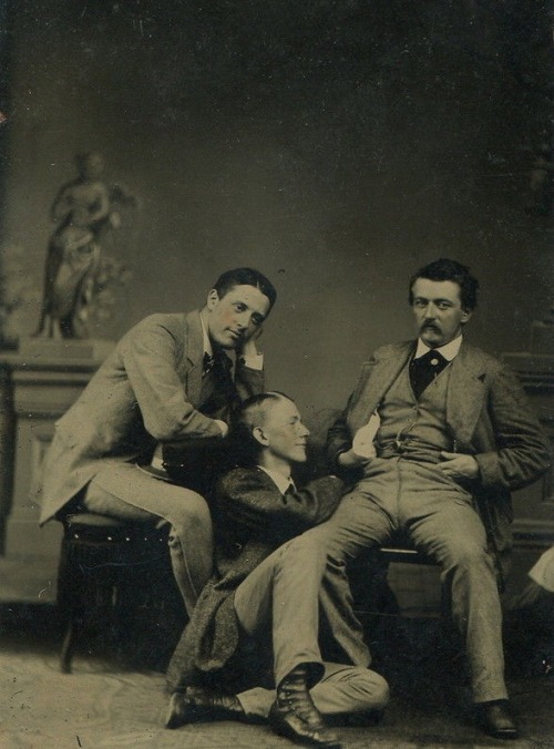 A touching portrait, here, a trio of affectionate men in the early 1900s, each with a hand-tinted bl