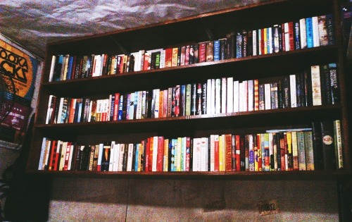 The hanging bookshelf my father built for me a while back.