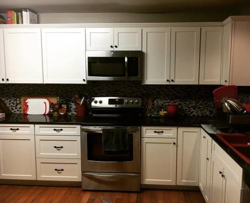 <p>Come to camp. See the kitchen. See it from the dining room. You couldn’t do that before. #lesscabinetspacemorejoy #discobacksplash  (at Fiddlestar)</p>