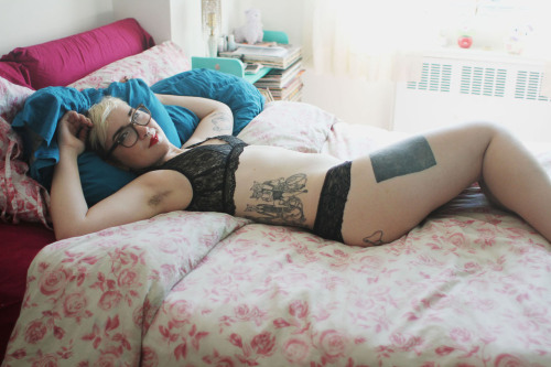 lyra posing in her bed. adult photos