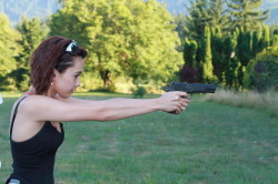 girlandguns:  Girl With Gun  http://girls-andguns.blogspot.com/