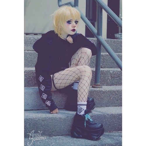 pleaserusa:🤡Porcelain clown aesthetic is what we live for and @anzujaamu captures it perfectly and pairs it with a pair of moon pathform #Demonia Boxer-01 lace-up shoes 🤡. A staple in cyber/goth/jfashion/90’s lover aesthetic since the early 2000’s