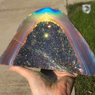 sixpenceee:A rainbow crystal geode from here