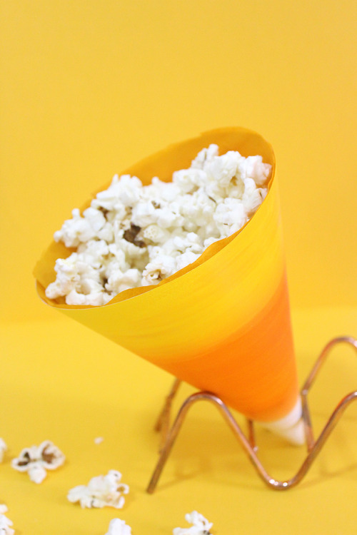 thecraftables:DIY Candy Corn Popcorn Holders!Last week, we worked on some DIY Halloween Games and th