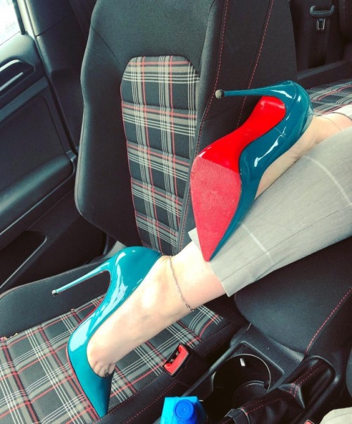 engineeringinheels: Grabbing my purse from the back . @louboutinworld #highheels #redsoles #redbotto