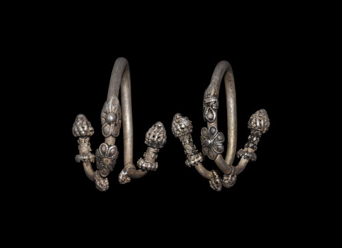 Pair of silver Greek earrings, c. 5th century BCE. From Timeline Auctions