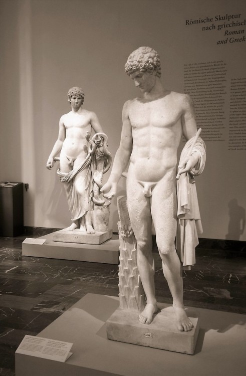 facesofthepast:In the background: Colossal Statue with Cornucopia, Snake and Portrait of Antinous. M
