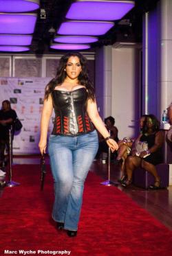 vanillaedge:  Snug jeans, curvy hips, leather top, dark looks. All she’s missing is a whip. 