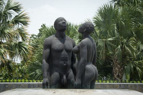 polworld:  The bronze sculpture “Redemption Song”, depicting a man and woman emerging from a pool of water, meant to wash away the pain of slavery is seen in Kingston (Jamaica) on June 29, 2012. more here 