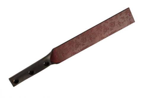 Eros leather spanking paddle by Dog & Hoop.Available with a rounded or square end. 16 inches fro