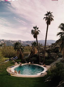 A wealthy group of young people relax by a pool in California, USA, in 1940, photographed by J Baylor Roberts, National Geographic