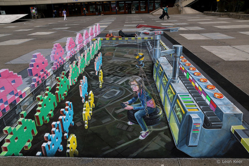 huffingtonpost:  3D Space Invader street art is the best use of chalk. (Source: Leon Keer)