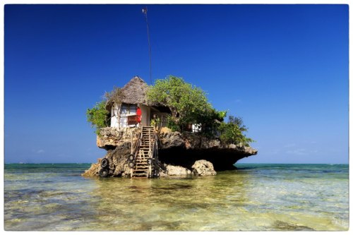 kushandwizdom:  odditiesoflife:  The Tiny Rock Restaurant in the Sea At beautiful Michanwi Pingwe Beach on Zanzibar’s coast in Africa is an incredibly unique restaurant. The restaurant is so small, it’s perched on a fossilized bed of coral located