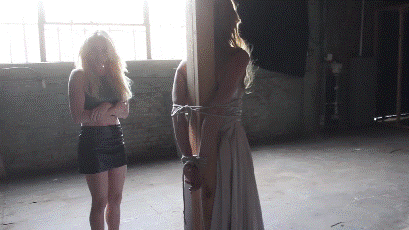 stoneyflake:  Blonde in silky dress tied to a post in an abandoned building. Perfect.