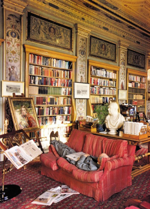 The 11th Duke of Devonshire takes a nap in the Lower Library of Chatsworth House, Derbyshire, circa 