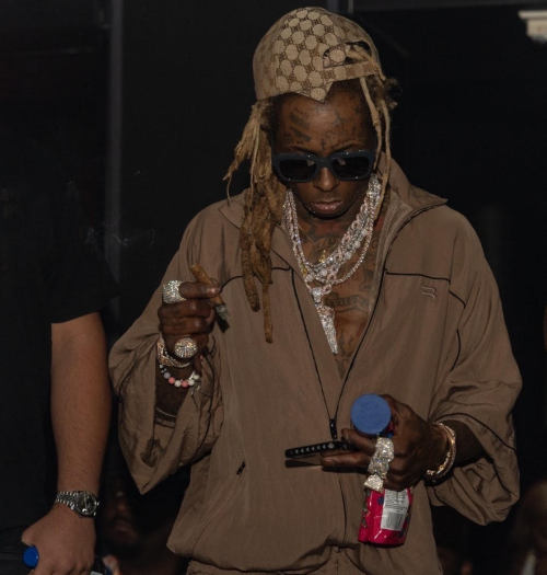 Lil Wayne Jams Out To Young Dolph & Performs Live At “LIV On Sunday: Basel Edition” 