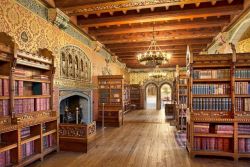 cair–paravel:The library at Cardiff Castle. It occupies the site of the medieval great hall and was designed by William Burges in the 1870s for then-owner John Crichton-Stuart, 3rd Marquess of Bute. The room is known for its beautiful, intricate and