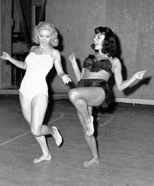  Candy Barr and Joan Collins.