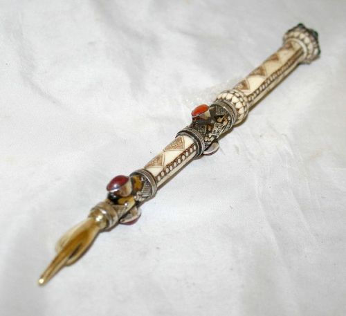 Sterling silver and cow bone yad (Torah pointer) from Turkmenistan.