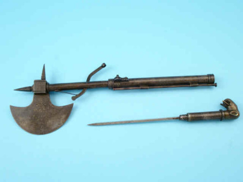 Rare Indian matchlock musket/axe combination gun dated 1750.  Handle unscrews to reveal the barrel a