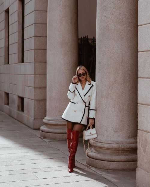 Giulia Gaudino in a Silvian Heach navy blazer/dress and Luisaviaroma boots  