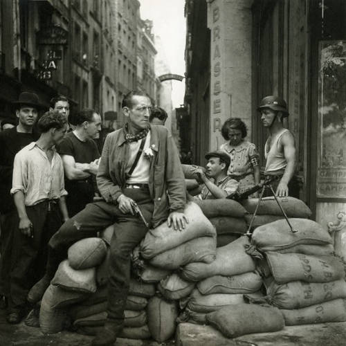 itshistory: French Resistance fighters man a barricade in Paris (August, 1944). Source: https://im