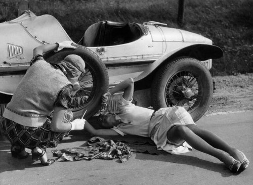 Two girls repairing their car, 1935 Nudes