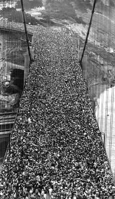 termanal-velocity:  historicaltimes:  Golden Gate Bridge opening day on May 27th, 1937. via reddit  Wow everyone, let’s get on this bridge for cars so cars can’t get on it!