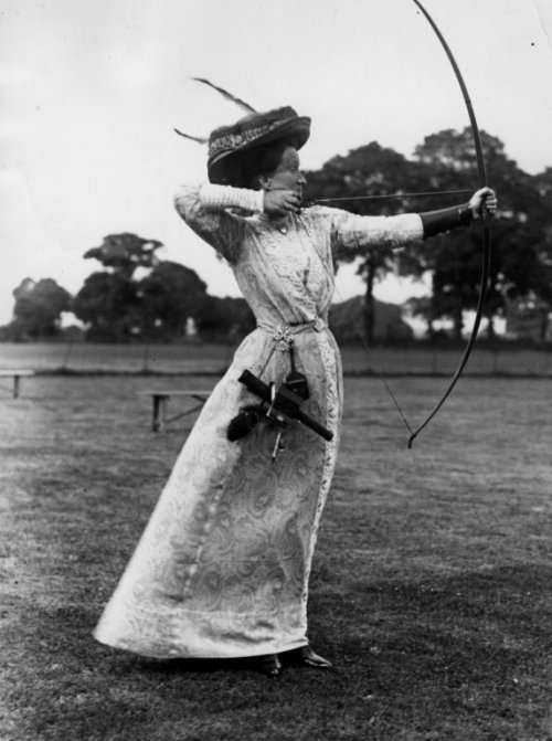 Miss Hepburn drawing her bow during the Ladies Day meeting of the Mid-Surrey Bowmen at Surbiton, 191