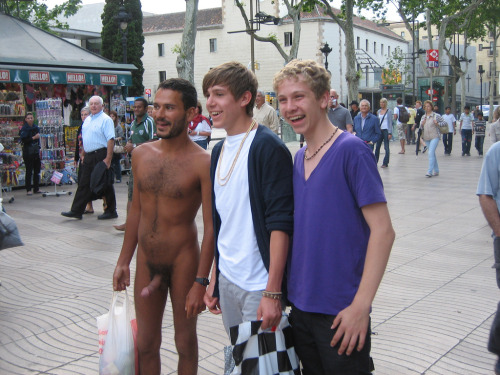 enjoyexhibitionists: Oh, my God. He’s not only naked in public, he’s hard as hell. And n