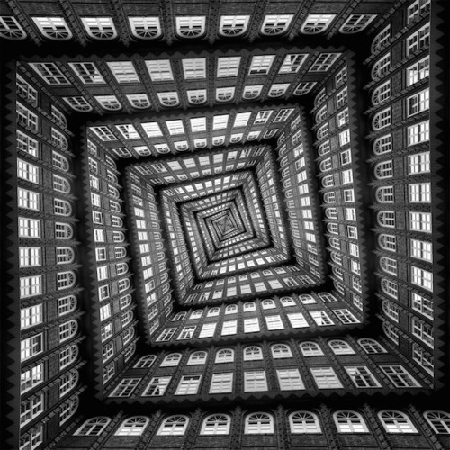 asylum-art:  Dizzy Architecture Views by Markus Studtmann  Here is a series of photographs made by the artist Markus Studtmann : he captures architectural facades and staircases, mostly by low angle, to emphasize the graphic beauty and hypnotic movement