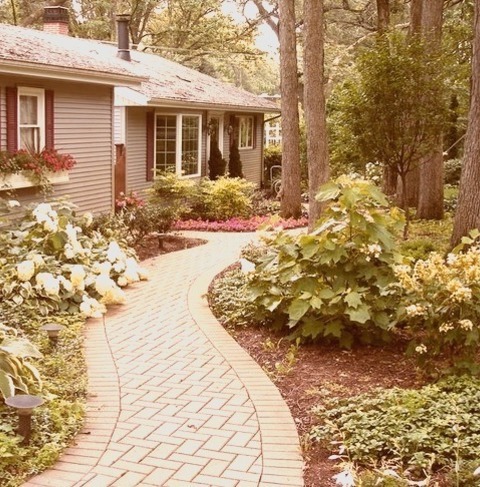 Image Of A Formal Brick Front Yard In A Large Transitional Home. Photo Of A Large Transitional Front