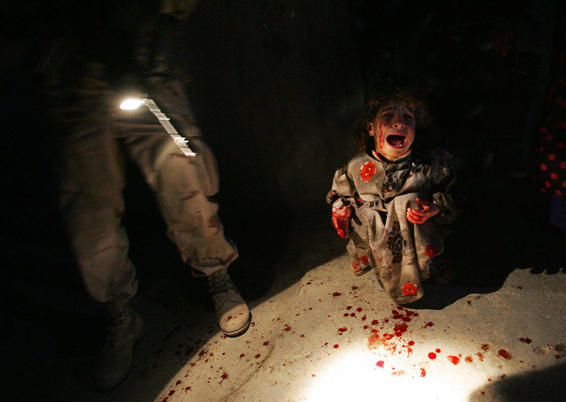 “ It was one of the most searing images of the war in Iraq: a tiny girl, splattered in blood and screaming in horror after her parents had been shot and killed by American soldiers who fired on the family car when it failed to yield for a foot patrol...