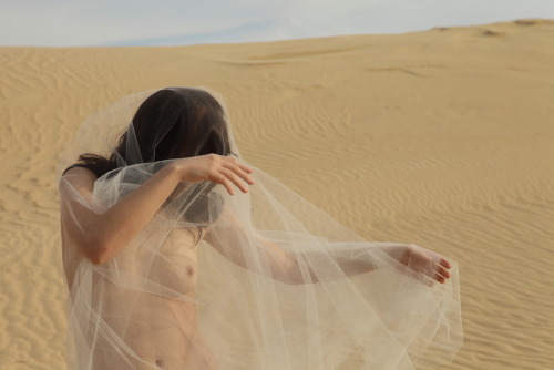 rebeccadimovski:  Enigma. I’ve started noticing two opposites attracting in my works as of recent. The delicate yet graciously constricted female form dancing with how simple and untouched our sacred land is. What i’m essentially doing is forming