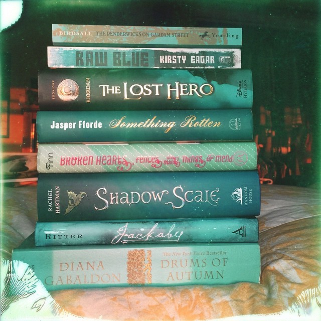 Since @bookaddictsguide tagged everyone in the #bookcolortag, and I’m taking lots of pictures of my books right now, here’s my color: teal! Some of my favorites in this pile! #books #bookstagram #teal #color #instabooks