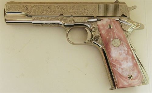 mickjagger:  Colt 1911, chambered in .38 Super.