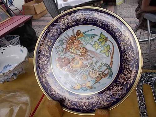 Plates offered for sale on flea market of antiquities - Wroclaw, Poland (May 2022).