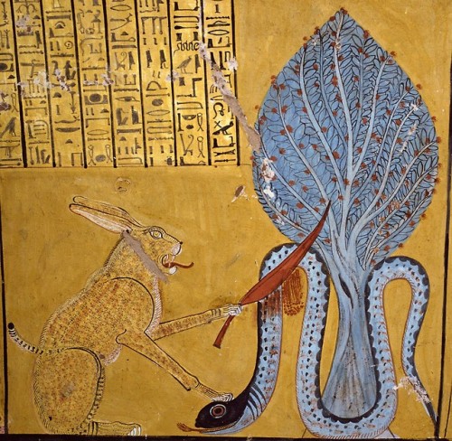 Under a sacred sycamore the sun god Ra, in the form of a cat, slays the snake Apep (or Apophis), god