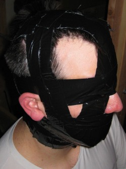 bondagejock:    @bondagejock in duct tape muzzle 