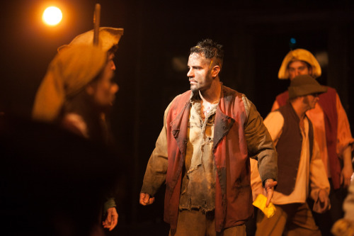 Dennis Moench confronts Ramin Karimloo, as Valjean, in the Prologue Harvest scene. Photo by max