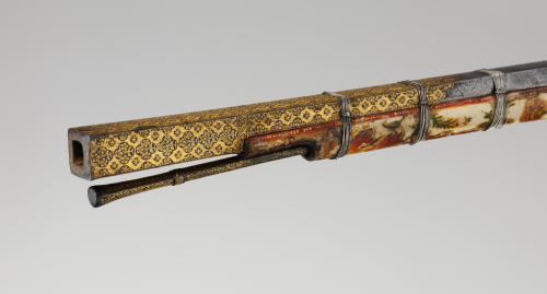 A magnificently decorated matchlock rifle originating from India, 18th century.  Note the square bor