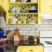 awlwren:himfluenza:we’ve been hooting with delight over green kitchens as we should be but have we considered: yellow kitchens. I think we should consider yellow kitchens.[id: photos of kitchens, some with yellow tiled backsplash, many with yellow-painted