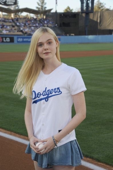 elle fanning throws the first pitch at a dodgers game