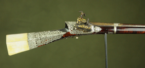 A beautiful Ottoman (Turkish) silver and gold inlaid miquelet musket.